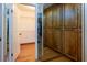 Large walk-in closet with ample shelving and built-in cabinets at 12945 Morris Bridge Rd, Thonotosassa, FL 33592