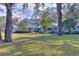 Ranch-style home with a large yard and mature trees at 12945 Morris Bridge Rd, Thonotosassa, FL 33592