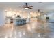 Spacious kitchen with granite countertops and stainless steel appliances at 12945 Morris Bridge Rd, Thonotosassa, FL 33592