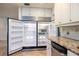 Spacious refrigerator with multiple shelves and drawers at 12945 Morris Bridge Rd, Thonotosassa, FL 33592