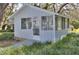 Charming detached guest house with screened porch at 12945 Morris Bridge Rd, Thonotosassa, FL 33592