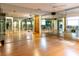 Spacious dance studio with mirrored walls and hardwood floors at 12945 Morris Bridge Rd, Thonotosassa, FL 33592