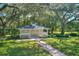 Lovely gazebo nestled in a lush, green backyard at 12945 Morris Bridge Rd, Thonotosassa, FL 33592