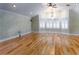 Bright bedroom with hardwood floors and bay window with plantation shutters at 12945 Morris Bridge Rd, Thonotosassa, FL 33592