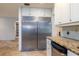 Large built-in refrigerator with ample storage space at 12945 Morris Bridge Rd, Thonotosassa, FL 33592