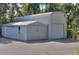 Metal garage with attached workshop at 12945 Morris Bridge Rd, Thonotosassa, FL 33592