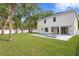 Large backyard with a private pool, spa, and white fence at 4005 W San Rafael St, Tampa, FL 33629