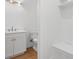 Elegant half bathroom featuring a vanity with white countertop and modern fixtures at 4005 W San Rafael St, Tampa, FL 33629