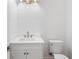 Modern bathroom with white vanity, marble countertop, and bronze fixtures at 4005 W San Rafael St, Tampa, FL 33629