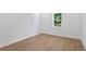 Bright bedroom with hardwood floors and a window with a view at 4005 W San Rafael St, Tampa, FL 33629