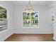 Dining room with large windows that view the backyard pool at 4005 W San Rafael St, Tampa, FL 33629