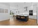 Bright, open kitchen with a large island, stainless appliances, and hardwood floors at 4005 W San Rafael St, Tampa, FL 33629