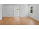 Spacious main bedroom with hardwood floors and ensuite bathroom with soaking tub and shower at 4005 W San Rafael St, Tampa, FL 33629