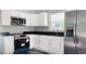 Recently updated kitchen with stainless steel appliances at 10008 N Jasmine Ave, Tampa, FL 33612