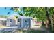 Newly painted house with carport and fenced backyard at 10008 N Jasmine Ave, Tampa, FL 33612