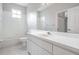 Bathroom with white vanity, tub and tiled floor at 34841 Double Eagle Ct, Zephyrhills, FL 33541