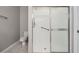 Bathroom with shower stall and white tile at 34841 Double Eagle Ct, Zephyrhills, FL 33541