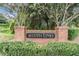 Attractive brick entrance sign welcomes residents to Augusta Links community at 34841 Double Eagle Ct, Zephyrhills, FL 33541