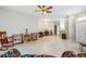 Living room with tiled floors and a rocking chair at 34841 Double Eagle Ct, Zephyrhills, FL 33541
