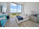 Bright bedroom with a king-size bed and stunning city views at 5120 Marina Way # 16005, Tampa, FL 33611