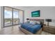 Spacious bedroom with a platform bed and large windows at 5120 Marina Way # 16005, Tampa, FL 33611