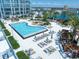 Resort-style pool with plenty of lounge chairs and umbrellas at 5120 Marina Way # 16005, Tampa, FL 33611