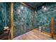 Unique hallway with green walls and decor at 5120 Marina Way # 16005, Tampa, FL 33611