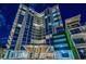 Modern high-rise building at night with architectural details and entrance at 5120 Marina Way # 16005, Tampa, FL 33611