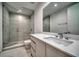Modern bathroom with walk-in shower and vanity at 5120 Marina Way # 16005, Tampa, FL 33611