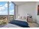 Bright bedroom with city view and comfortable bed at 5120 Marina Way # 16005, Tampa, FL 33611