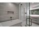 Modern bathroom with soaking tub and glass shower at 5120 Marina Way # 16005, Tampa, FL 33611