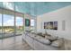 Open living area with sectional sofa and large screen TV at 5120 Marina Way # 16005, Tampa, FL 33611