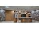 Modern community kitchen with granite countertops and stainless steel appliances at 5120 Marina Way # 16005, Tampa, FL 33611