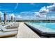 Resort-style pool with lounge chairs and umbrellas at 5120 Marina Way # 16005, Tampa, FL 33611