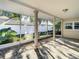 Screened patio with view of backyard at 3604 Rockaway Dr, Holiday, FL 34691