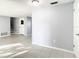 Bright living room with tile floors and sliding glass doors leading to the backyard at 3604 Rockaway Dr, Holiday, FL 34691