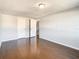 Bedroom with hardwood floors and double doors at 3604 Rockaway Dr, Holiday, FL 34691