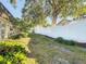 Large backyard with lush landscaping at 3604 Rockaway Dr, Holiday, FL 34691