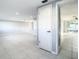 Bright living room with tile floors and access to backyard at 3604 Rockaway Dr, Holiday, FL 34691