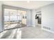 Living room with tile floors, neutral walls, and sliding doors to a patio at 3604 Rockaway Dr, Holiday, FL 34691