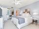 King-size bed in bright bedroom with balcony access and plenty of natural light at 90 S Highland Ave # 103, Tarpon Springs, FL 34689