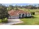 Aerial view showcases the home's sprawling yard and rural setting at 331 Lewis Rd, Lithia, FL 33547