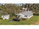 Aerial view of the property, including outbuildings at 331 Lewis Rd, Lithia, FL 33547