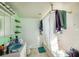 Bathroom with shower/tub combo and light green walls at 331 Lewis Rd, Lithia, FL 33547