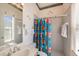 Charming bathroom with a shower/tub combo and whimsical decor at 331 Lewis Rd, Lithia, FL 33547