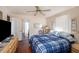 Spacious bedroom with wood floors and ceiling fan at 331 Lewis Rd, Lithia, FL 33547