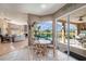Breakfast nook with view of pool and outdoor kitchen at 331 Lewis Rd, Lithia, FL 33547