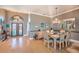 Elegant dining room with hardwood floors and southwestern decor at 331 Lewis Rd, Lithia, FL 33547