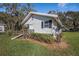 Home's side view showcasing a rustic exterior at 331 Lewis Rd, Lithia, FL 33547
