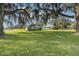 Single story home with front porch and large yard at 331 Lewis Rd, Lithia, FL 33547
